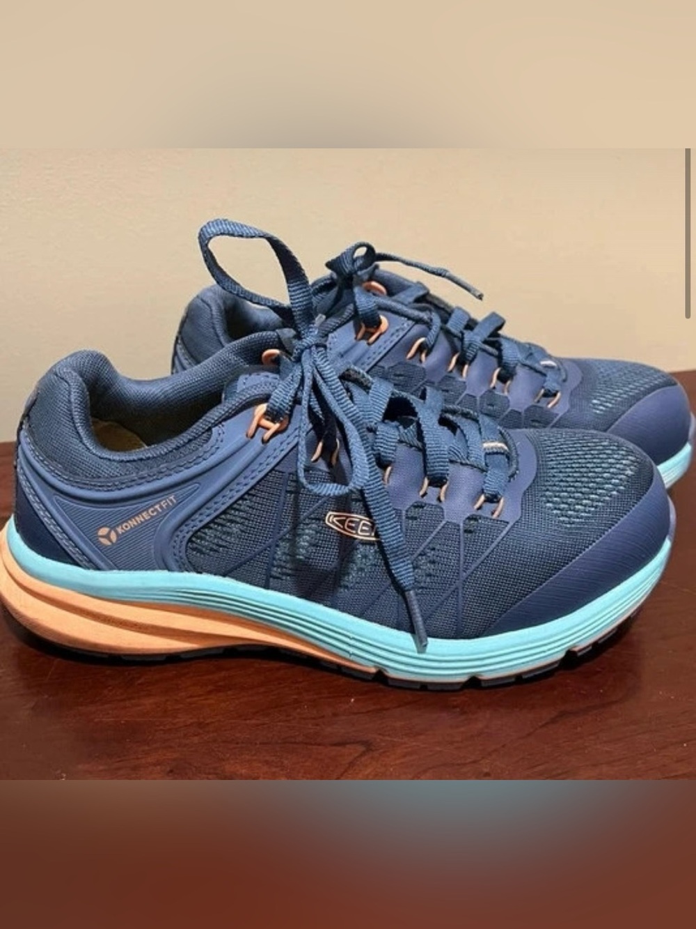 KEEN Women's Navy Blue Sneakers with Light Orange and Aqua Accents